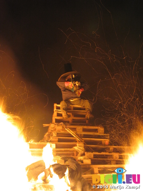 SX16779 Guy holding bomb on bonfire
